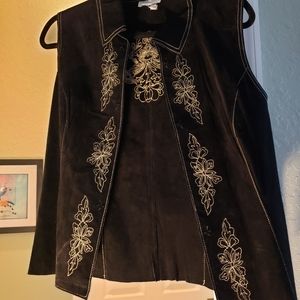 Embroidered vest with some small cutout detail